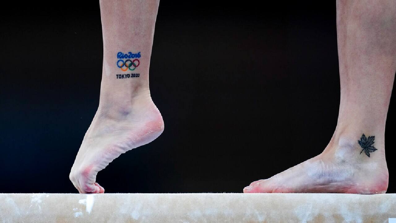Hyeres, Var, France - April 18, 2015: Tattoos of the Olympic rings on a  foot stock photo - OFFSET